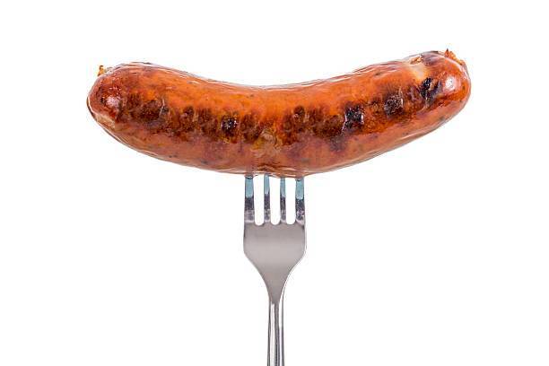 image_Sausage - Grilled Sausage on a fork isolated on white background